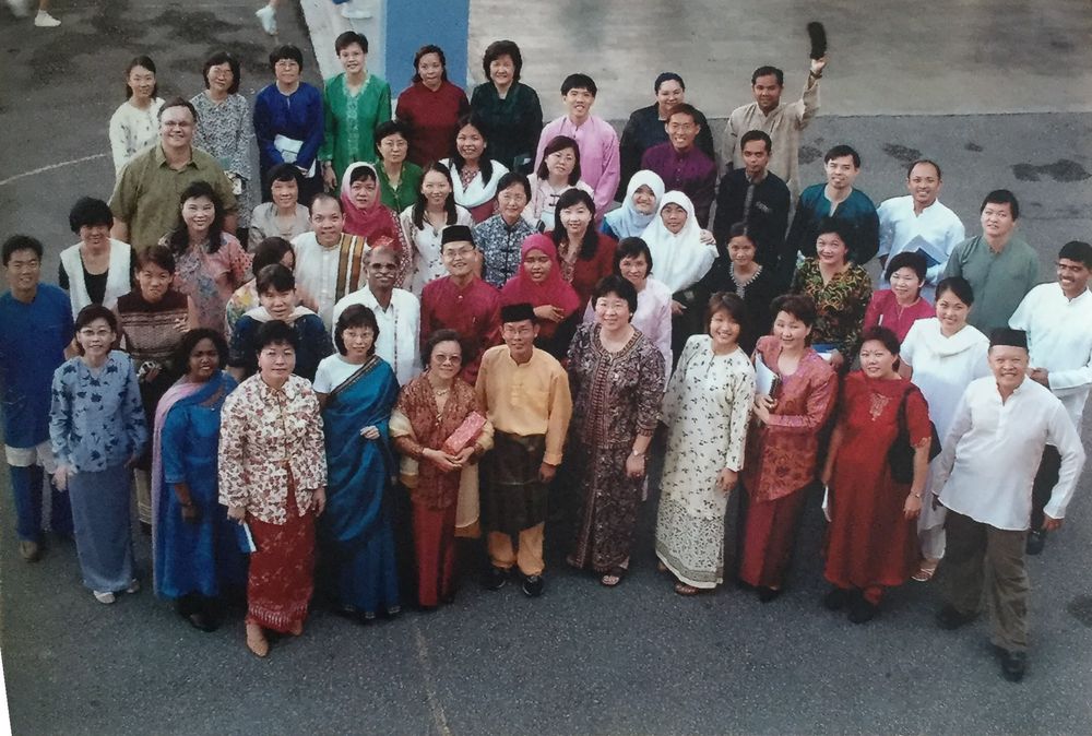 Ian with school colleagues in traditional dress for Racial Harmony Day