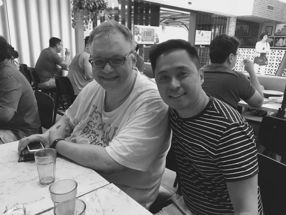 Ian catching up with a former student over a meal