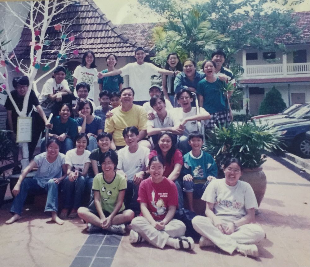 Ian, in yellow, with a church youth group